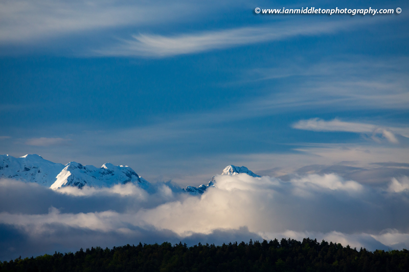 Rain clouds clearing over the Kamnik Alps after a day of heavy rain. On the higher ground they brought snow.