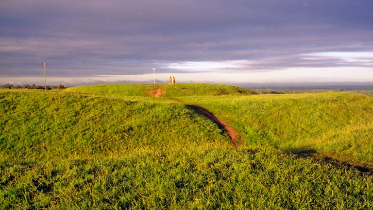 Iron age rath at the Hill of Tara in County Meath, Ireland. Tara was once the ancient capital of Ireland, from where the high king ruled over the country. The upright stone you see on the mound is the Lia Fail (stone of destiny). According to Celtic legend the Lia Fail was used during the coronation of the high king, and was believe to emit a roar when the true high king touched it. (I tried but there was no sound, so I crossed being high king of Ireland off my list of potential destinies).